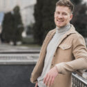 handsome-man-posing-outdoors-casually handsome-man-posing-outdoors-casually